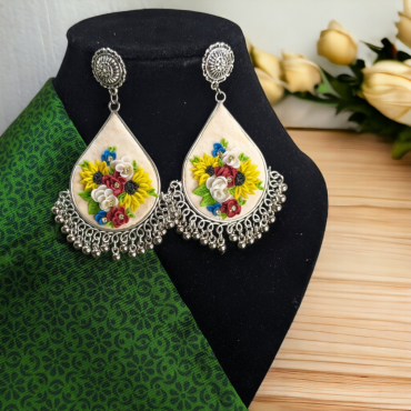 Multicolor flowers on White Chandbalis